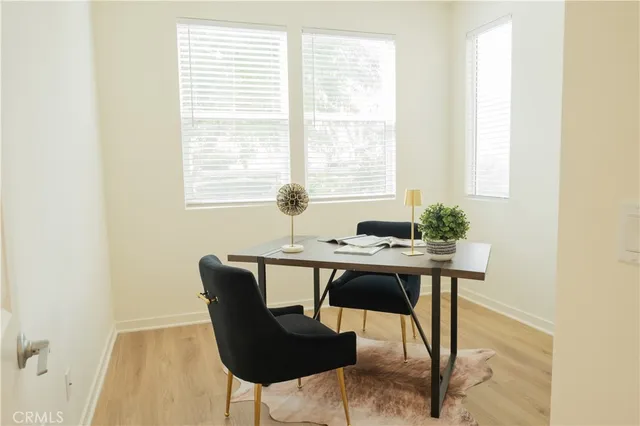 a bathroom with a shower a toilet and a sink