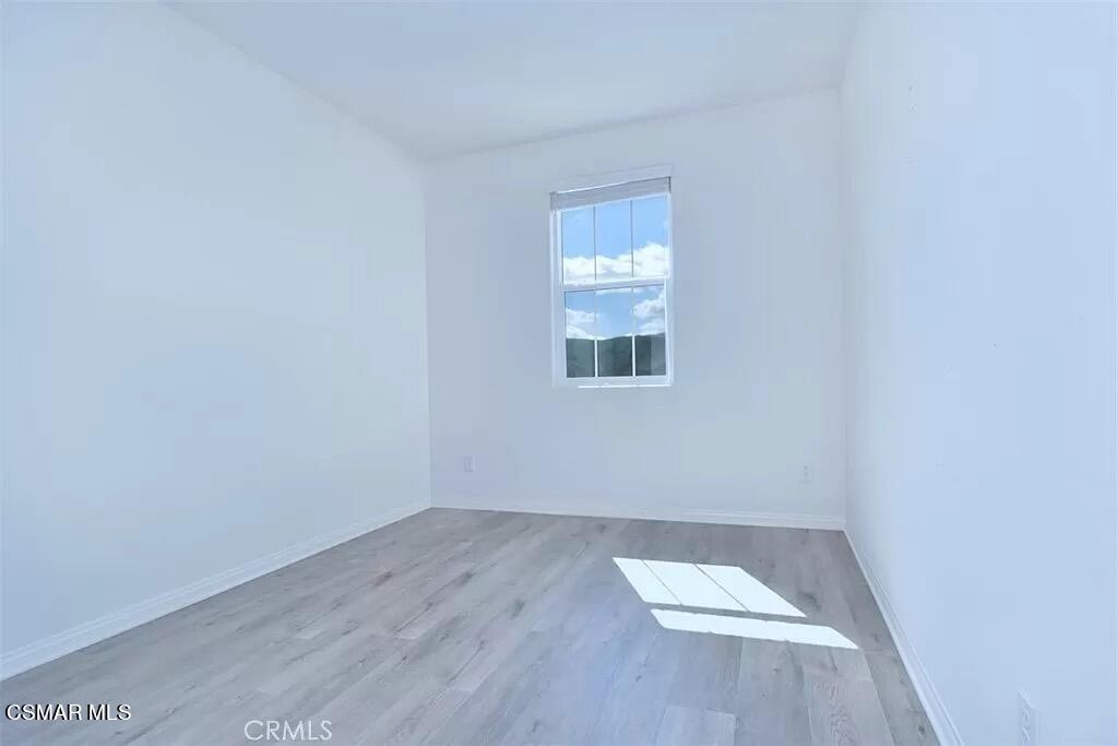 207 Morro Way, Unit 3 Simi Valley, CA 93065 - Photo 10 of 31 an empty room with a window