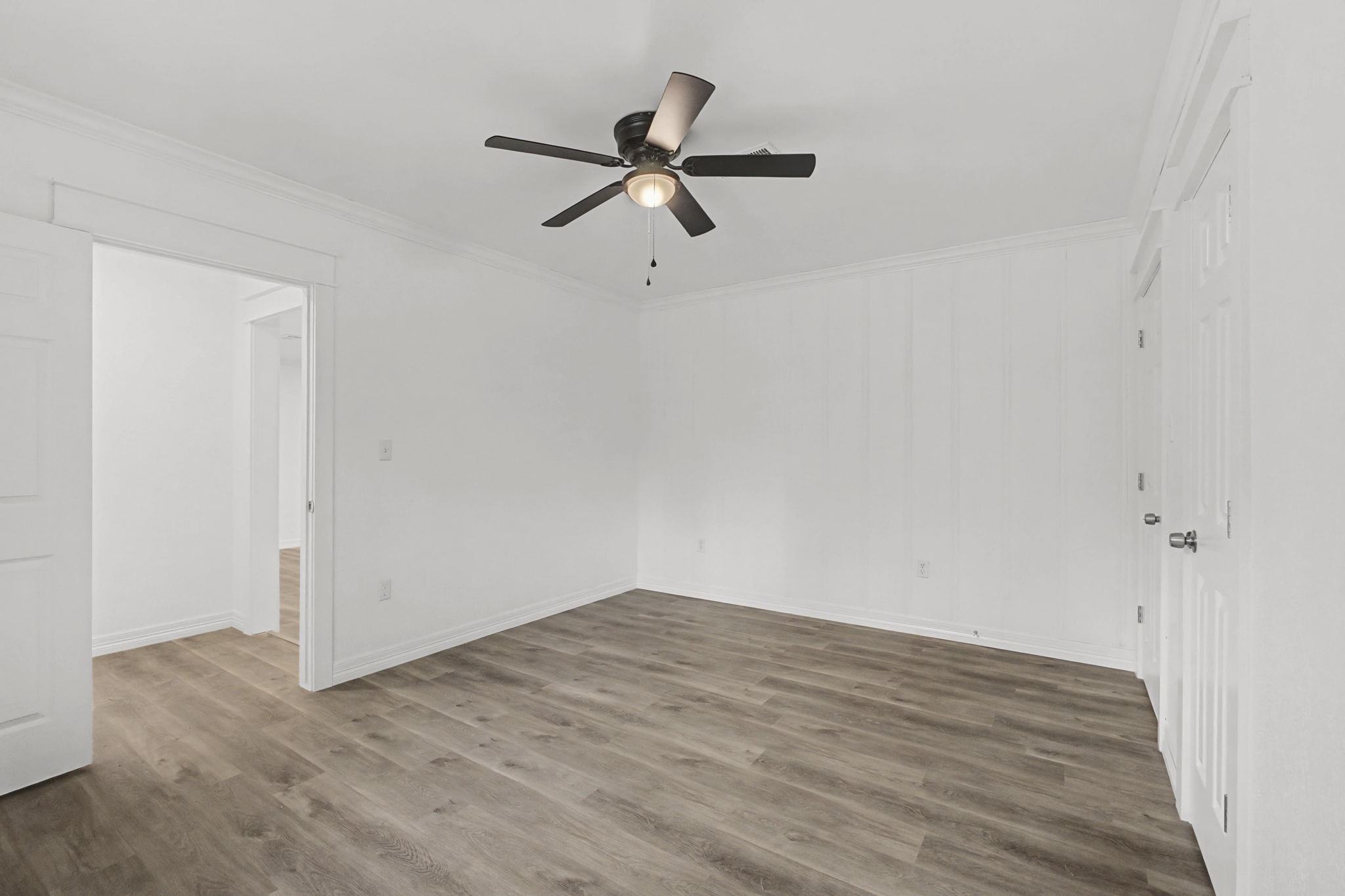 9216 Highway 69 Warren, TX 77664 - Photo 20 of 32 a view of empty room with wooden floor