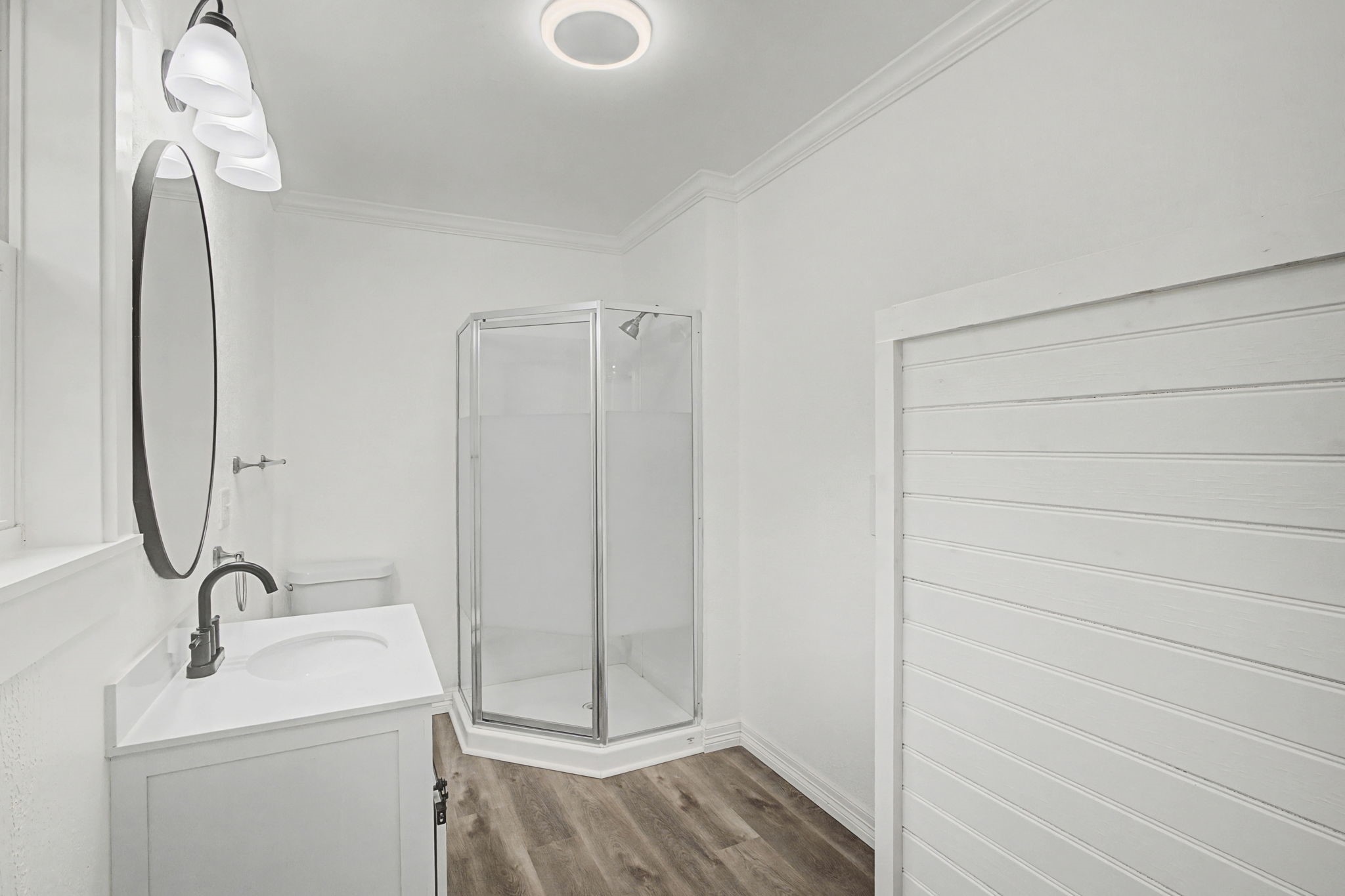 9216 Highway 69 Warren, TX 77664 - Photo 22 of 32 a bathroom with a sink a toilet and shower