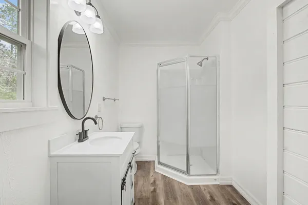 a view of a house with a backyard and porch