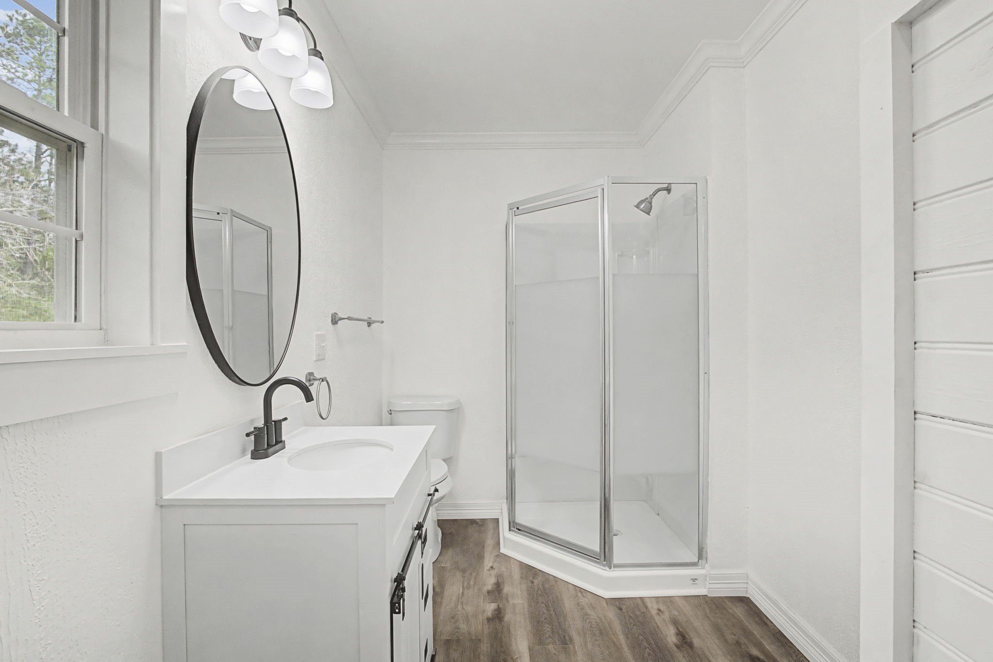9216 Highway 69 Warren, TX 77664 - Photo 23 of 32 a bathroom with a sink and a mirror