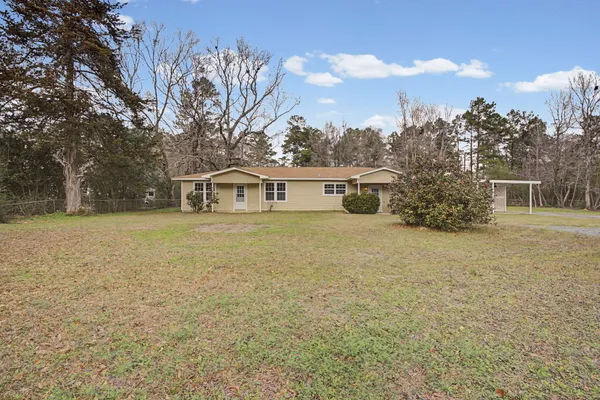 a house with trees in front of it