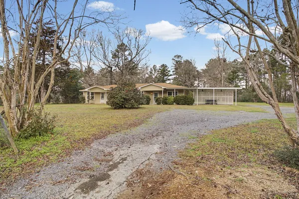 a house with trees in front of it
