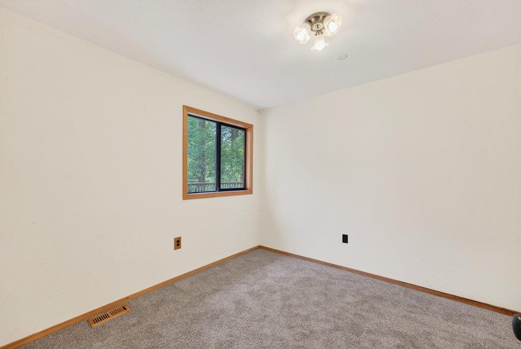 13033 Lompico Road Felton, CA 95018 - Photo 15 of 32 a view of an empty room with a window
