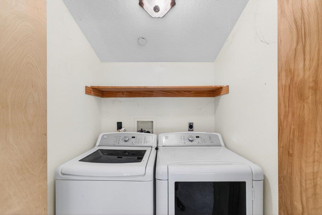 13033 Lompico Road Felton, CA 95018 - Photo 22 of 32 a utility room with dryer and washer