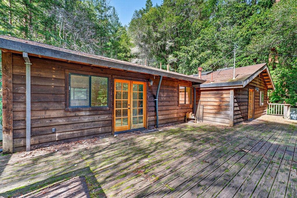 13033 Lompico Road Felton, CA 95018 - Photo 23 of 32 a view of a house with a garage