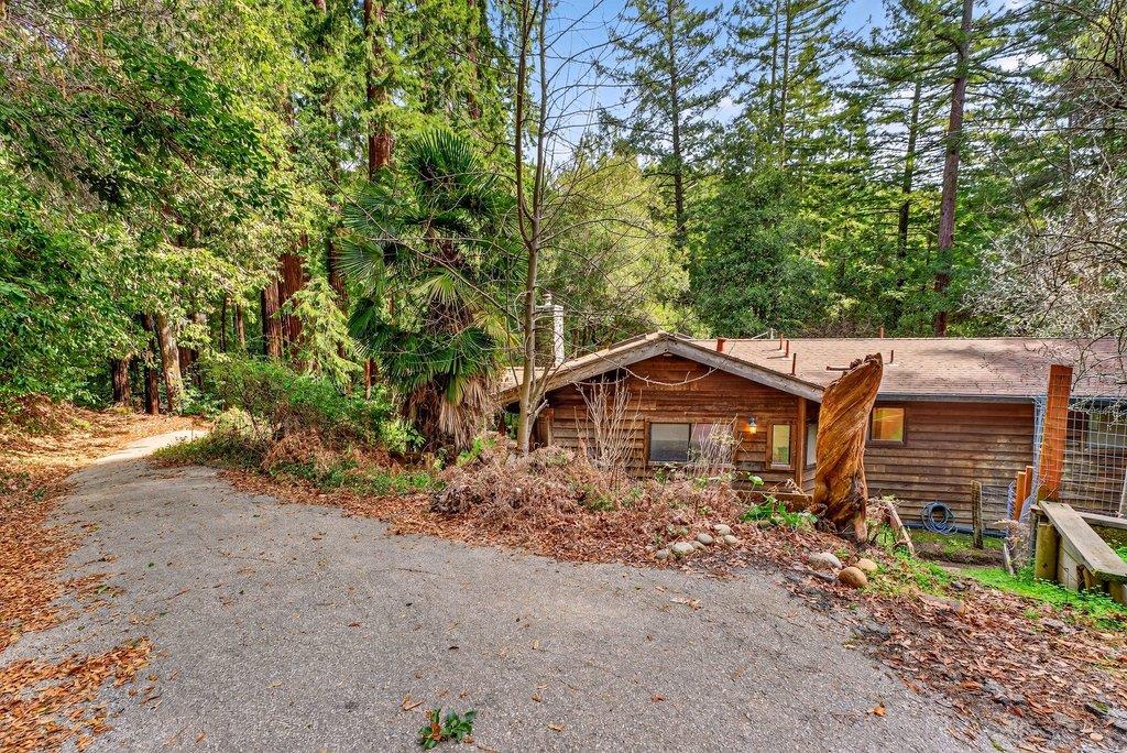 13033 Lompico Road Felton, CA 95018 - Photo 27 of 32 a front view of a house with a yard