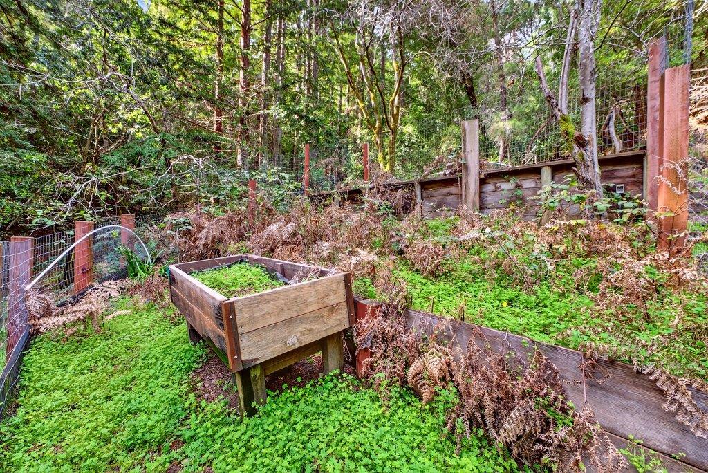 13033 Lompico Road Felton, CA 95018 - Photo 28 of 32 a backyard of a house with outdoor seating