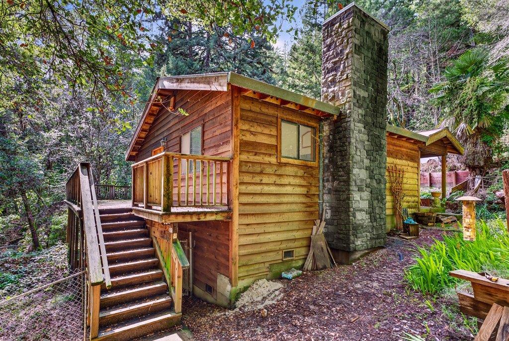 13033 Lompico Road Felton, CA 95018 - Photo 3 of 32 a view of a house with a yard