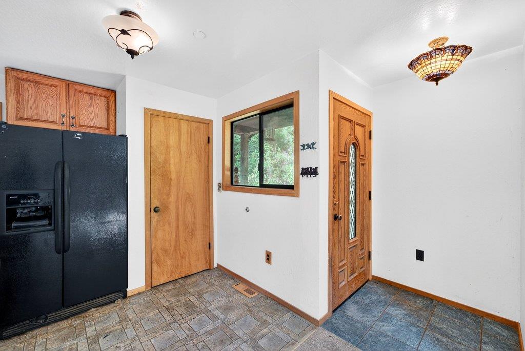 13033 Lompico Road Felton, CA 95018 - Photo 4 of 32 a view of a livingroom with a window