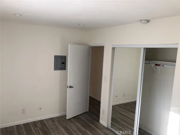 a view of a bathroom with wooden floor