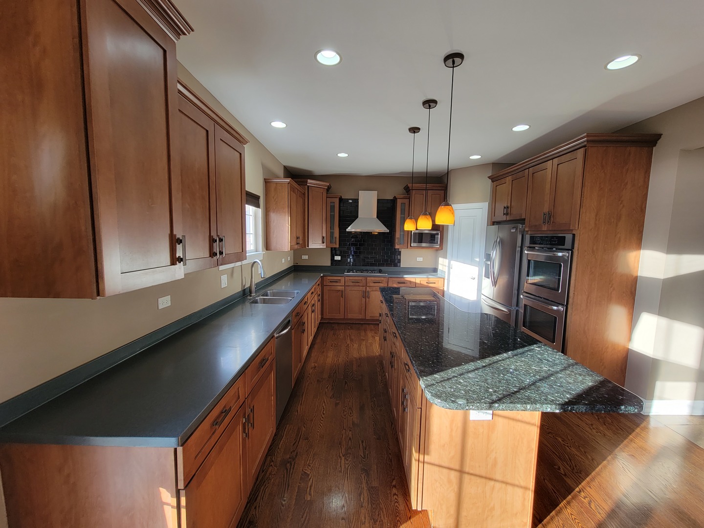 904 Deer Path Drive Antioch, IL 60002 - Photo 14 of 42 a kitchen with granite countertop stainless steel appliances lots of counter top space