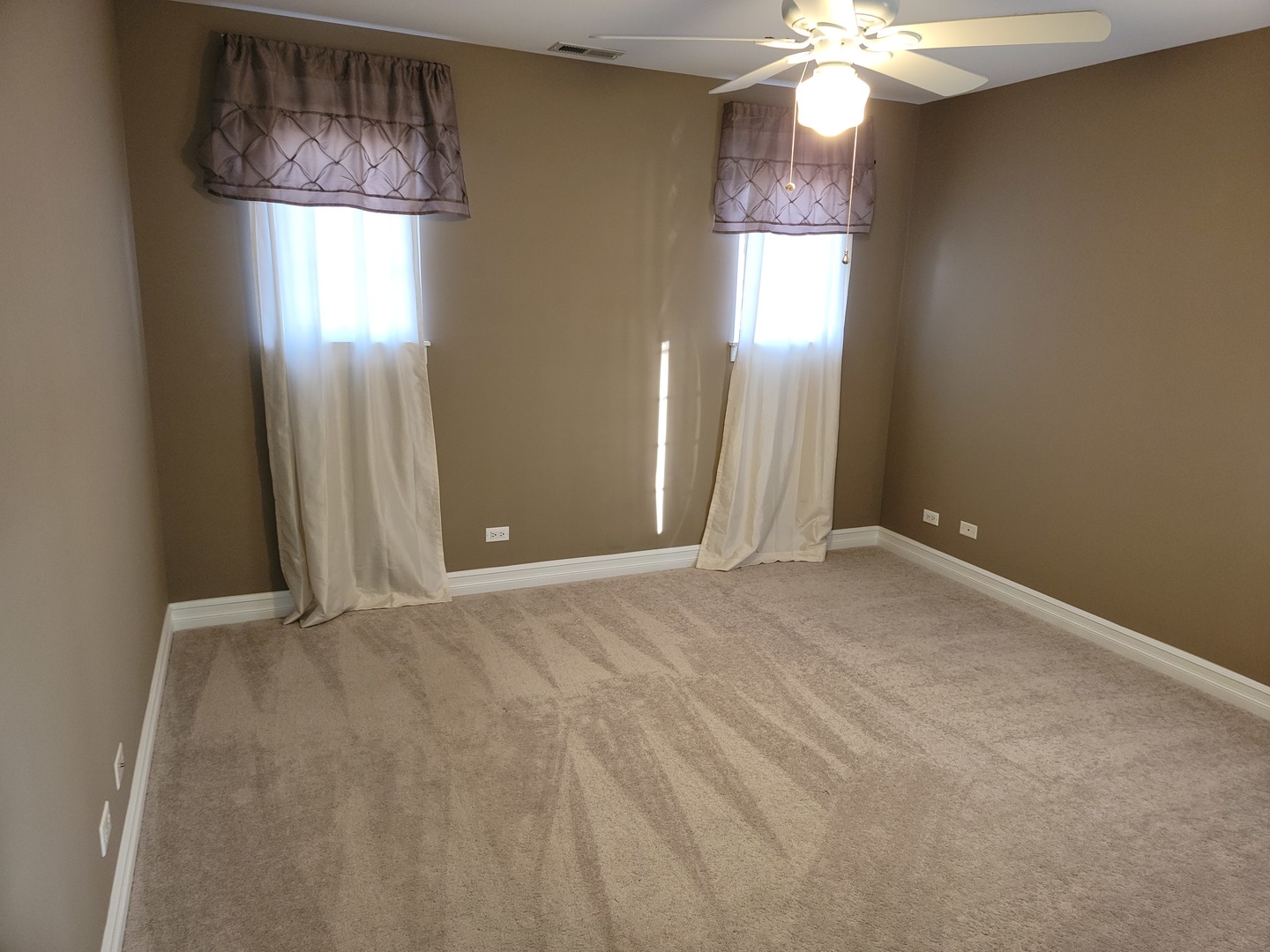 904 Deer Path Drive Antioch, IL 60002 - Photo 30 of 42 a view of an empty room with wooden floor and door