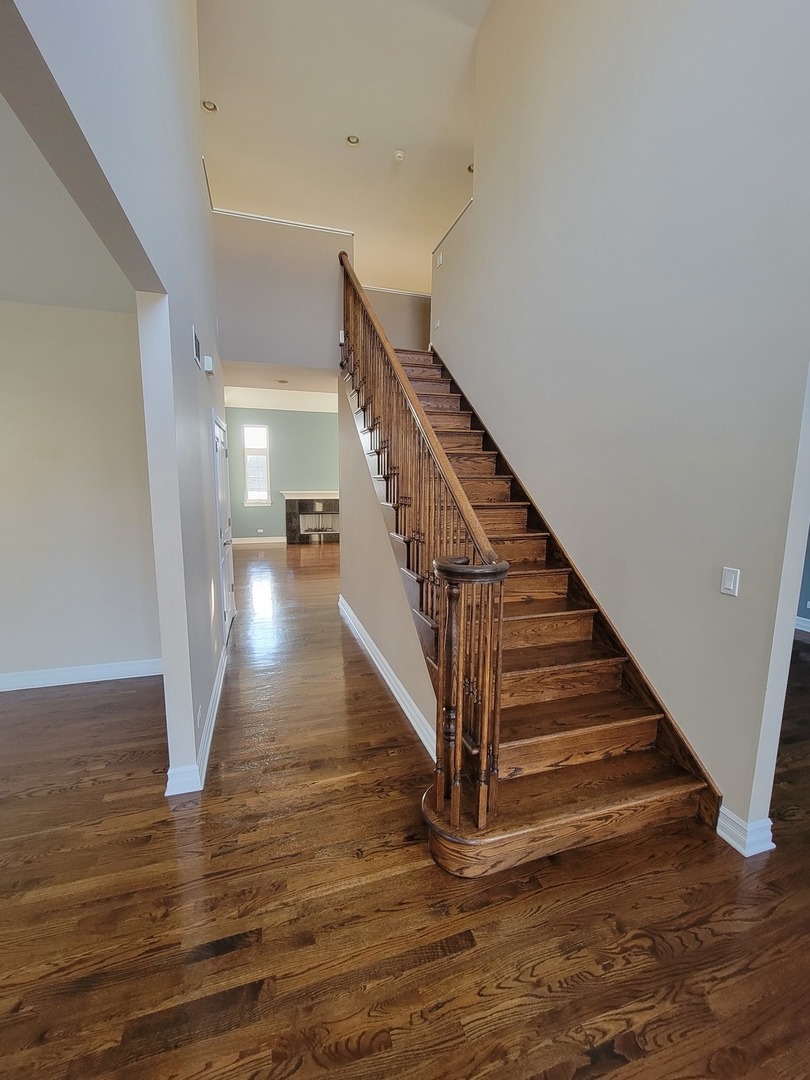 904 Deer Path Drive Antioch, IL 60002 - Photo 3 of 42 a view of entryway and hall with wooden floor