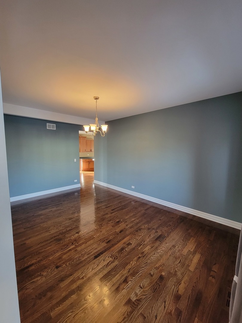 904 Deer Path Drive Antioch, IL 60002 - Photo 10 of 42 a view of empty room with wooden floor