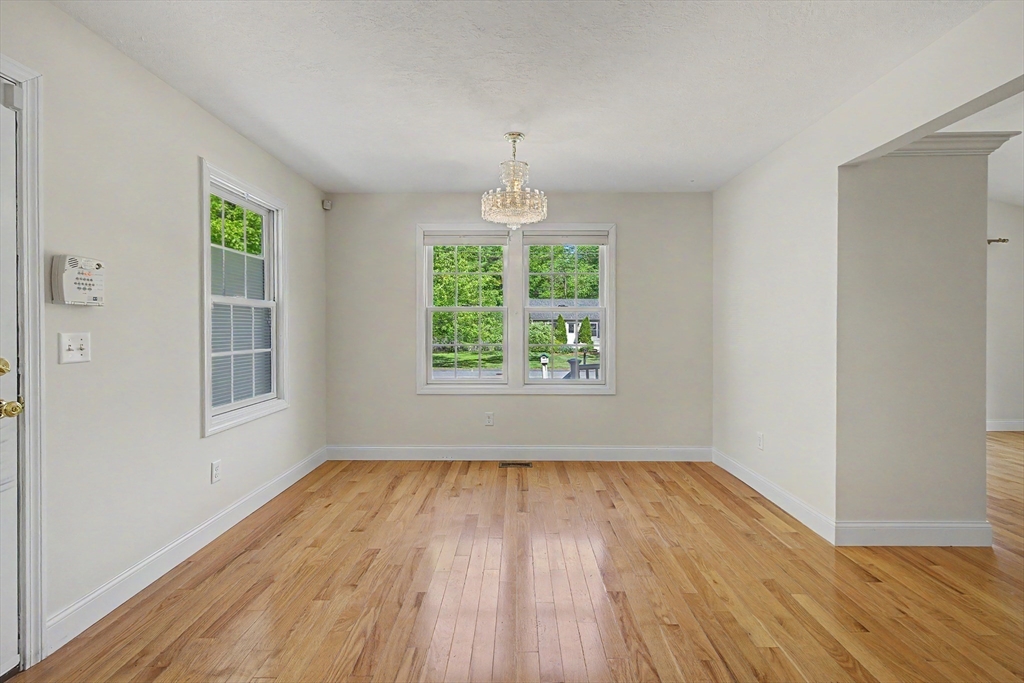 792 Ryan Road Northampton, MA 01062 - Photo 10 of 29 wooden floor in an empty room with a window