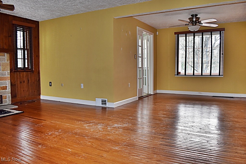 17600 Egbert Road Bedford, OH 44146 - Photo 7 of 49 Living Room / Dining Room with gleaming hardwood floors.