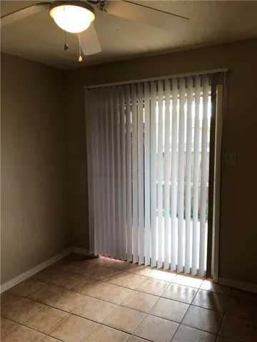 a view of hallway with natural light
