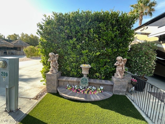 8175 Arville Street, Unit 210 Las Vegas, NV 89139 - Photo 17 of 36 View of yard featuring a patio