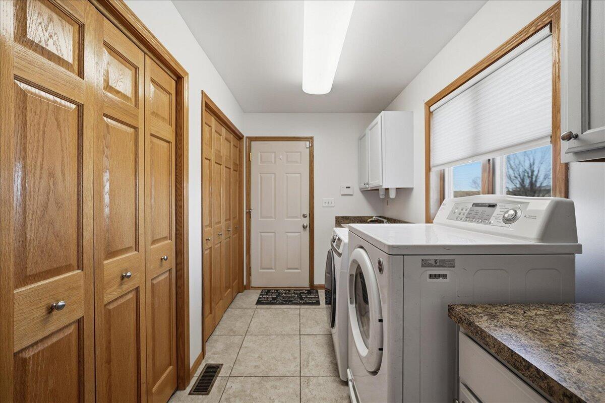 9741 Whitehall Garden Munster, IN 46321 - Photo 15 of 30 a utility room with dryer and washer