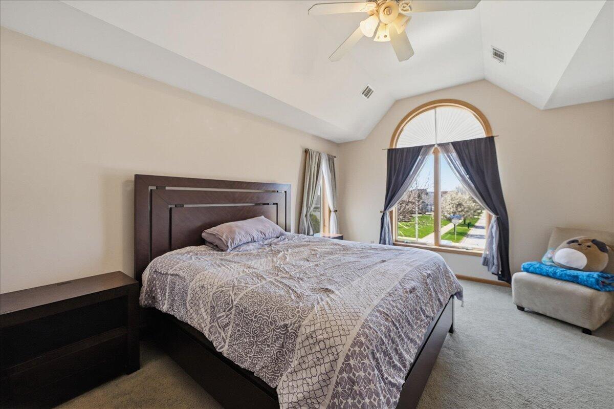 9741 Whitehall Garden Munster, IN 46321 - Photo 18 of 30 a bedroom with a bed and a window