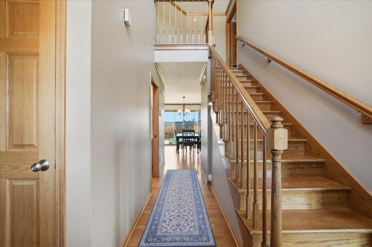 9741 Whitehall Garden Munster, IN 46321 - Photo 6 of 30 a view of a hallway with wooden floor and entryway