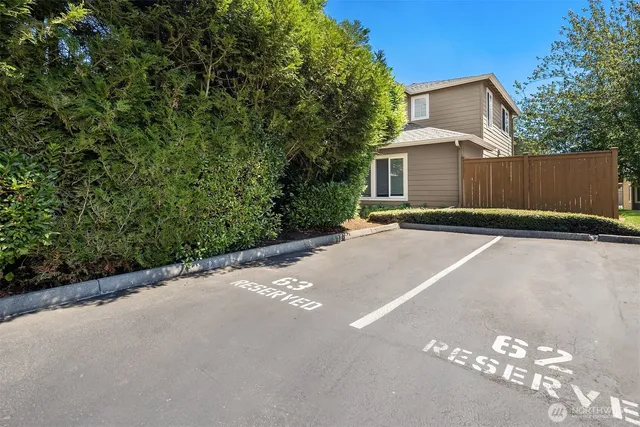 a swimming pool with outdoor seating and yard