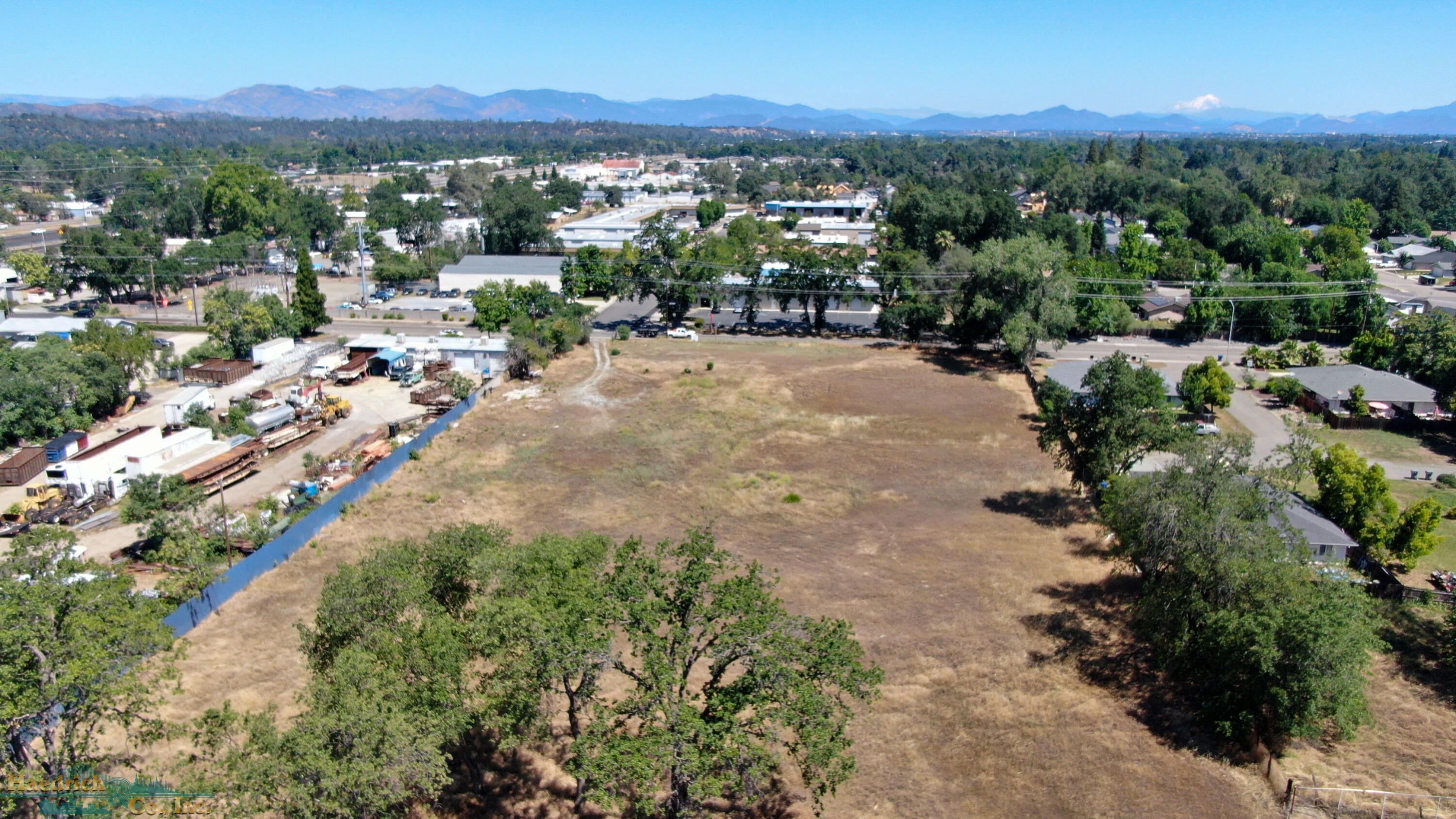 2431 Girvan Road Redding, CA 96001 - Photo 4 of 14 a view of a street with a yard