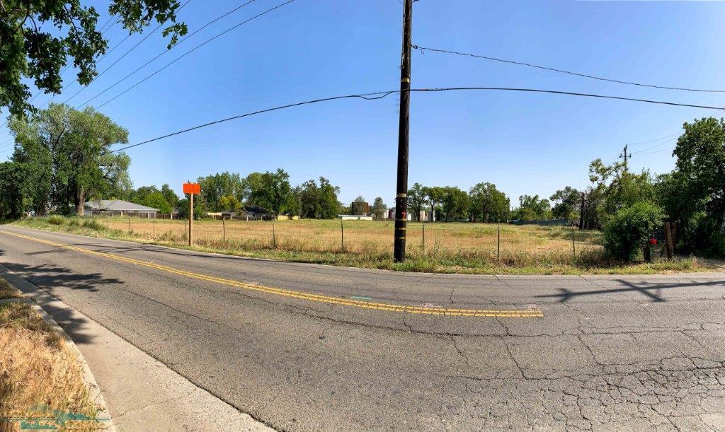 2431 Girvan Road Redding, CA 96001 - Photo 10 of 14 a view of a road with a building in the background