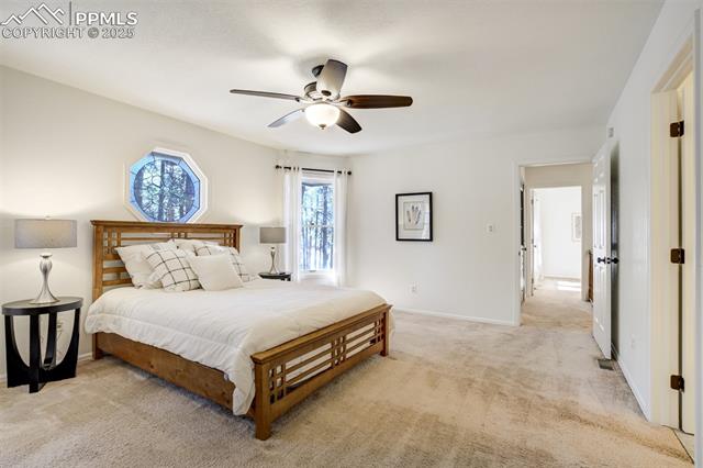 17865 Smugglers Road Monument, CO 80132 - Photo 19 of 50 Primary Bedroom with private bath and a balcony outside the door!