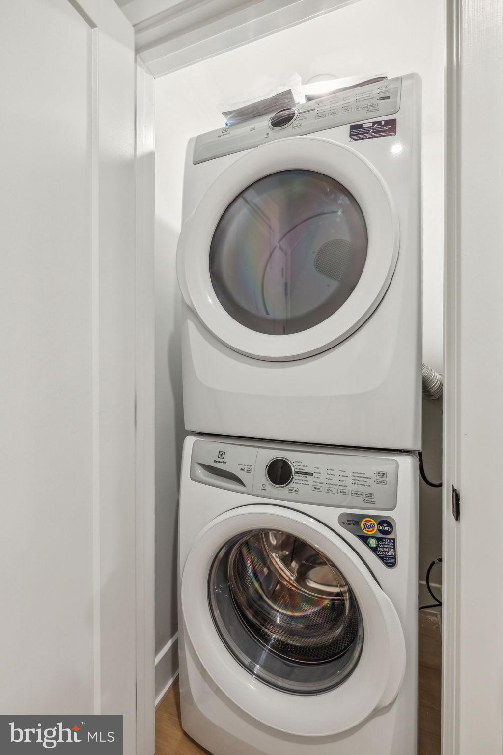 6910 Ridge Avenue, Unit 402 Philadelphia, PA 19128 - Photo 18 of 20 a utility room with dryer and washer