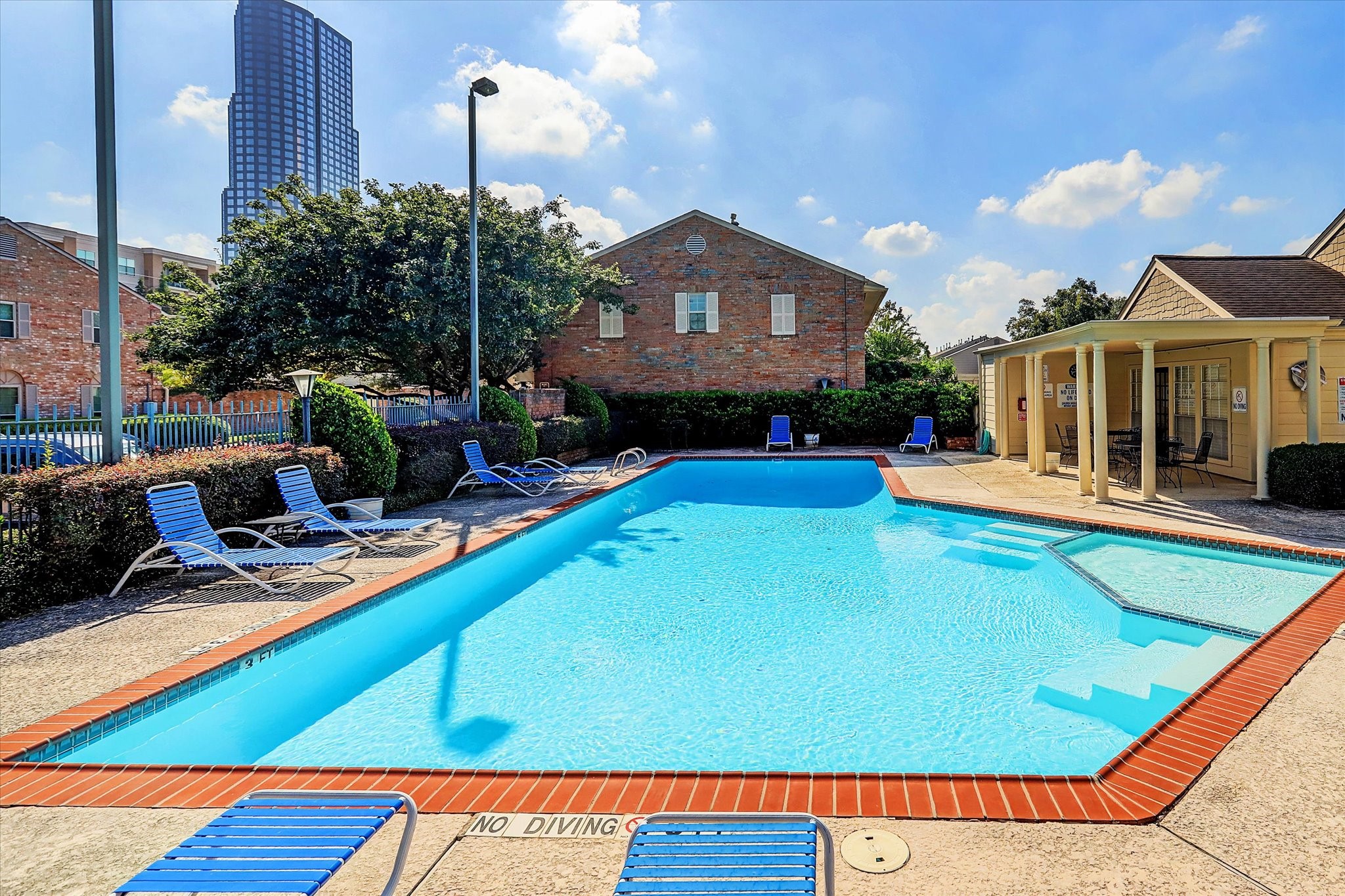 5823 Valley Forge Drive, Unit 93 Houston, TX 77057 - Photo 18 of 22 Tanglewest community pool and clubhouse