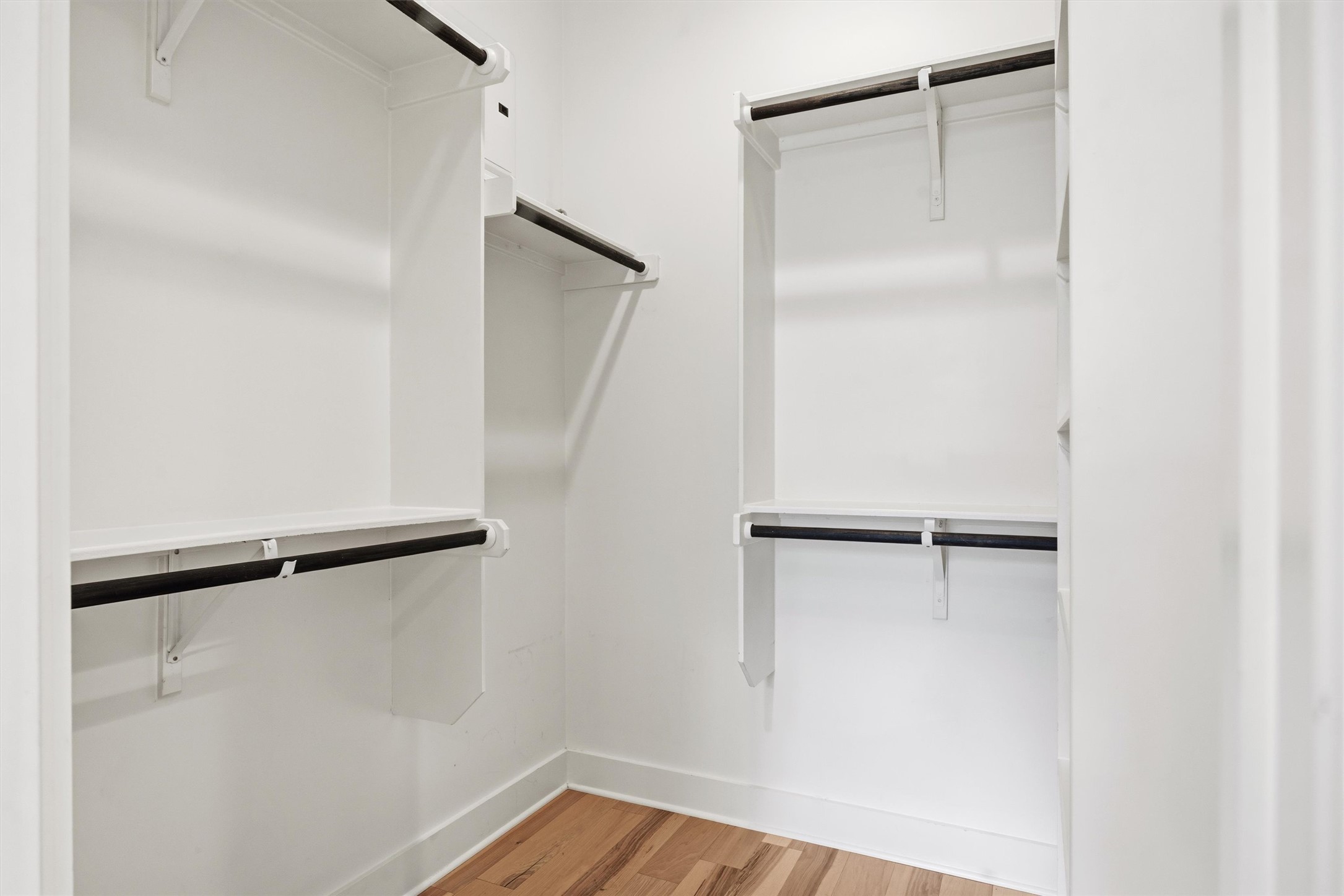 2314 Enfield Road, Unit 203 Austin, TX 78703 - Photo 19 of 37 A walk-in closet and direct bath access complete this well-appointed primary suite.