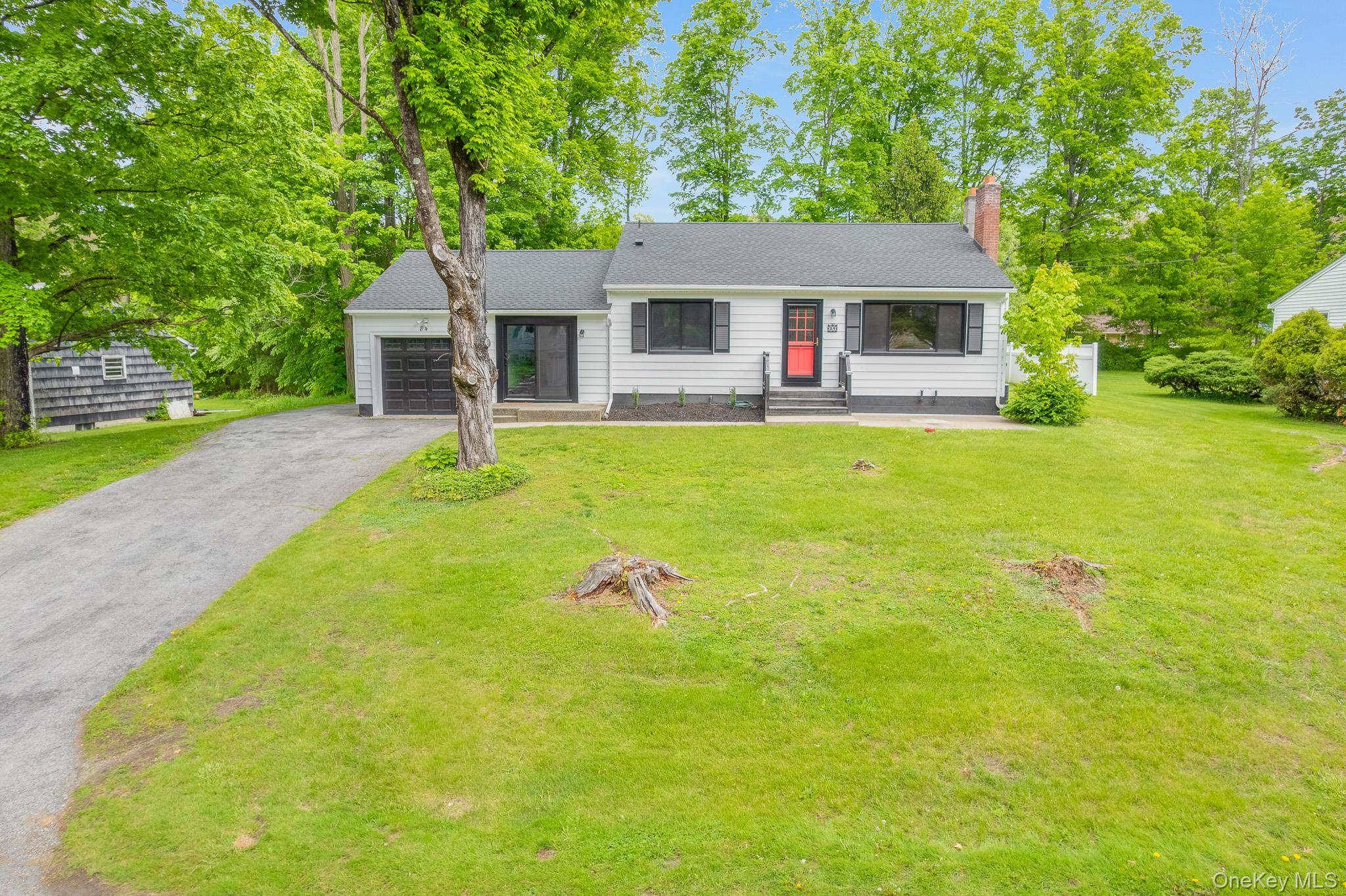 84 Sleight-Plass Road Poughkeepsie, NY 12603 - Photo 2 of 30 a front view of a house with yard and green space