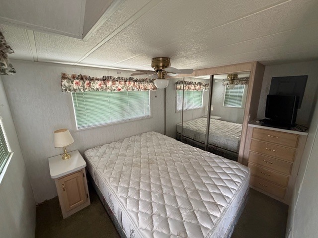 2795 East 28th Road Marseilles, IL 61341 - Photo 17 of 64 a bedroom with a bed and a television