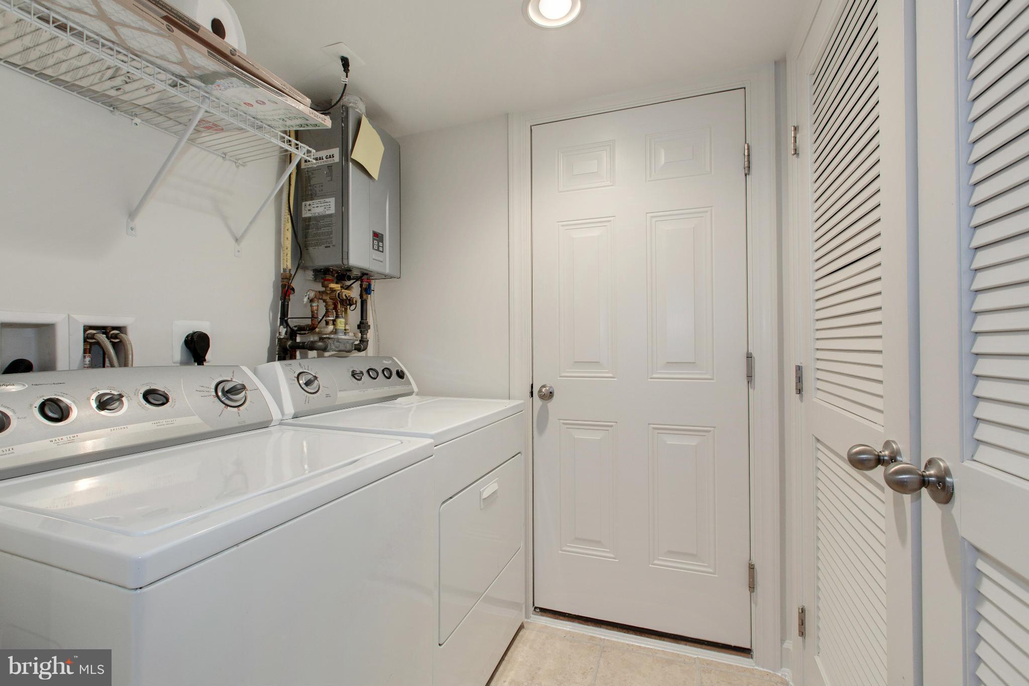 816 West Glebe Road Alexandria, VA 22305 - Photo 28 of 30 Laundry Room with Tankless Water Heater