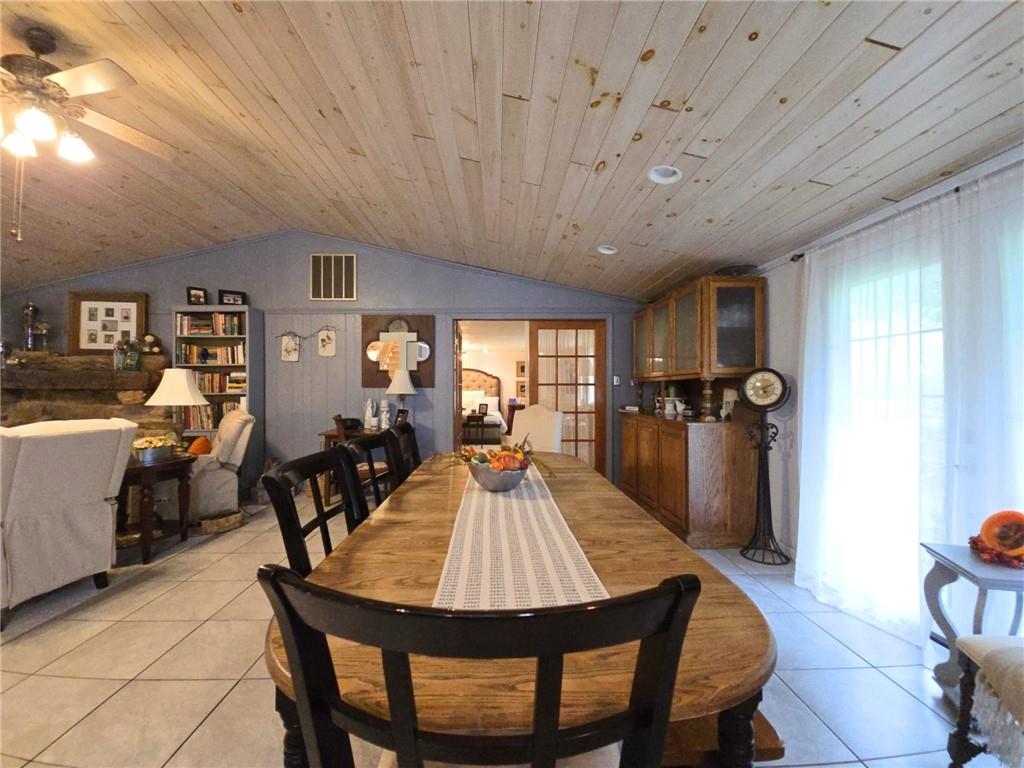1405 Madison Road Templeton, PA 16259 - Photo 11 of 50 a view of a dining room with furniture window and wooden floor