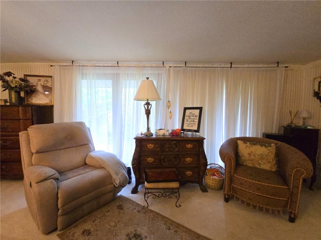 1405 Madison Road Templeton, PA 16259 - Photo 19 of 50 a living room with furniture and a window