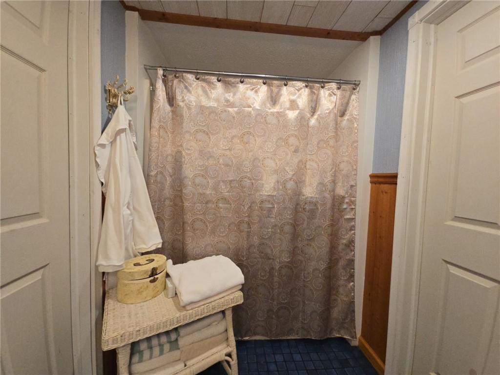 1405 Madison Road Templeton, PA 16259 - Photo 28 of 50 a bathroom with a sink and a mirror