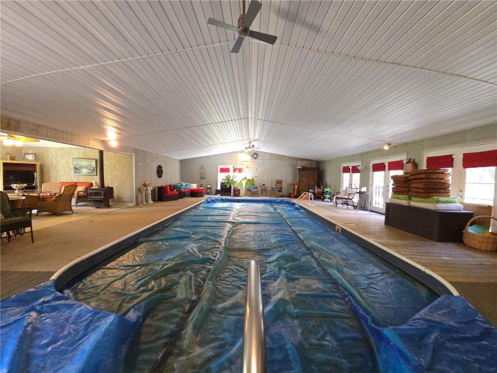 1405 Madison Road Templeton, PA 16259 - Photo 33 of 50 a swimming pool with outdoor seating