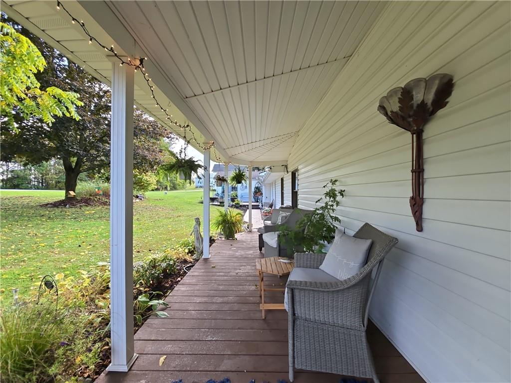 1405 Madison Road Templeton, PA 16259 - Photo 45 of 50 a view of a porch with furniture and garden