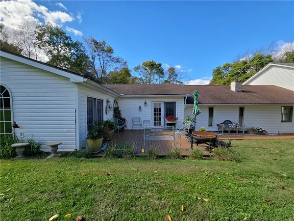 a view of a garden with an outdoor space
