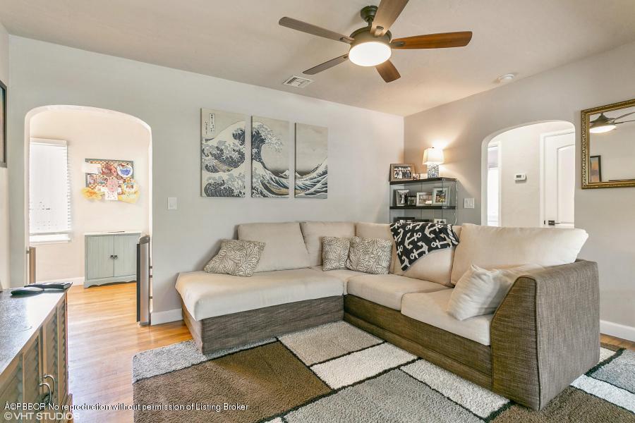 831 Hampton Road West Palm Beach, FL 33405 - Photo 2 of 10 a living room with furniture and a large window