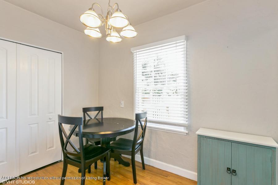 831 Hampton Road West Palm Beach, FL 33405 - Photo 5 of 10 a view of a dining room with furniture and window
