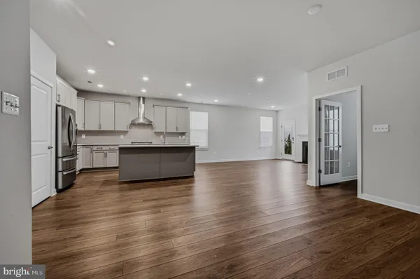 a view of kitchen with wooden floor