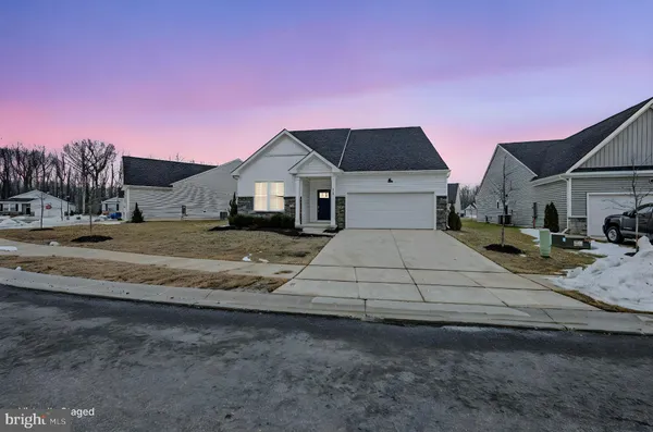 a house with yard in front of it