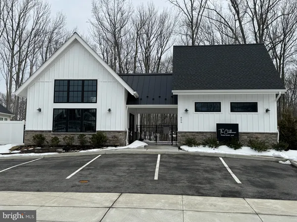 a front view of a house with garage