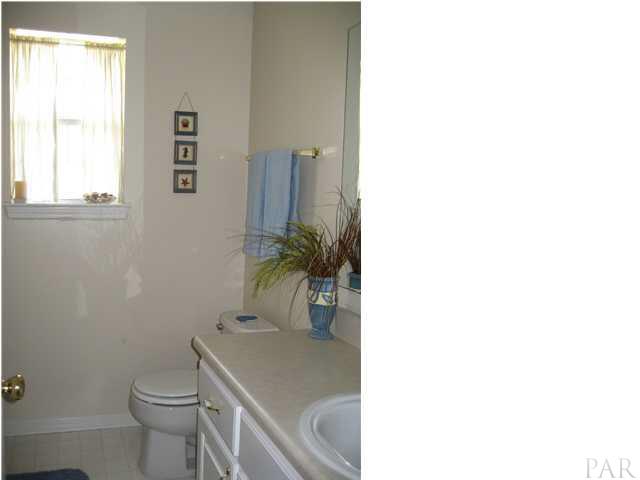4901 Timber Ridge Drive Pace, FL 32571 - Photo 16 of 24 Second bath is between those bedrooms
