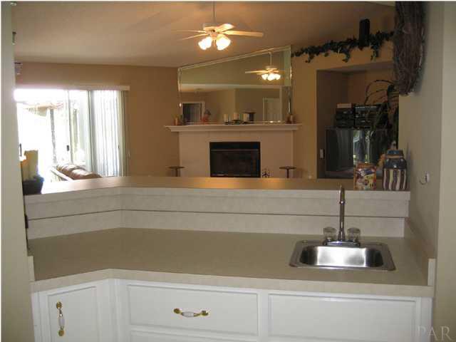 4901 Timber Ridge Drive Pace, FL 32571 - Photo 8 of 24 Wet bar in kitchen overlooks living room and is perfect for entertaining.